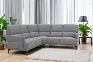 Amelie är en högryggad soffa med pocketsits. Går att få i både tyg och skinn.